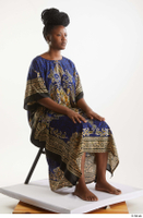 Dina Moses  1 dressed sitting traditional decora long african dress whole body 0006.jpg